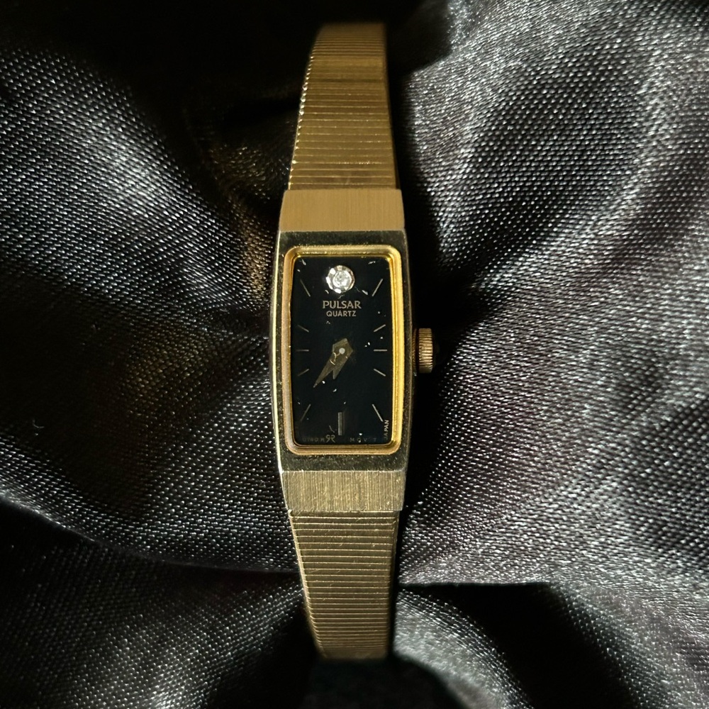 Gold and Black Pulsar Quartz Watch with Diamond